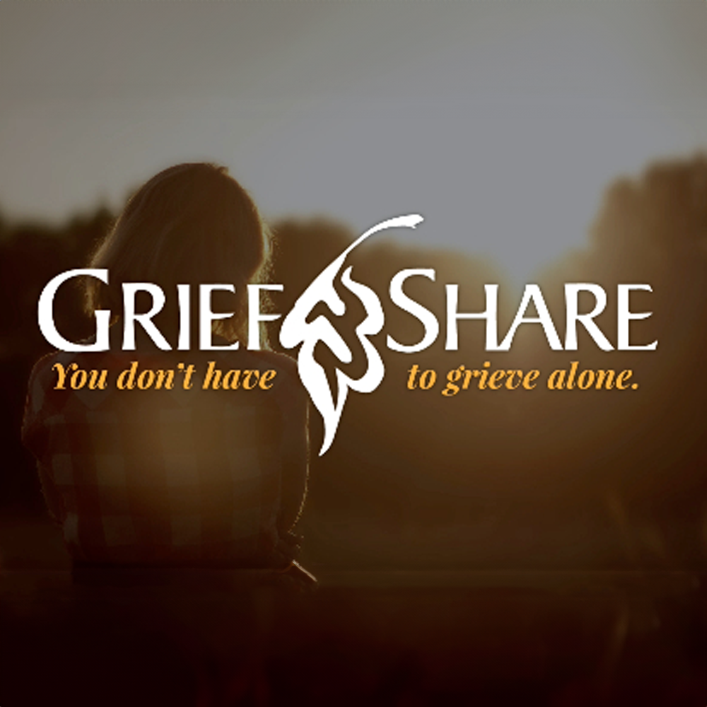 GreifShare image with logo and a young woman looking off in the distance at Sunset