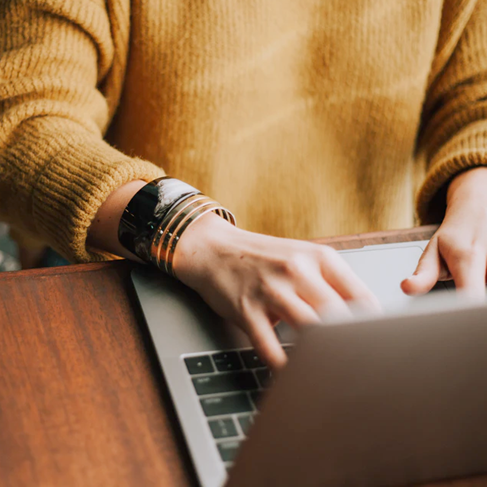 Woman sitting at a computer